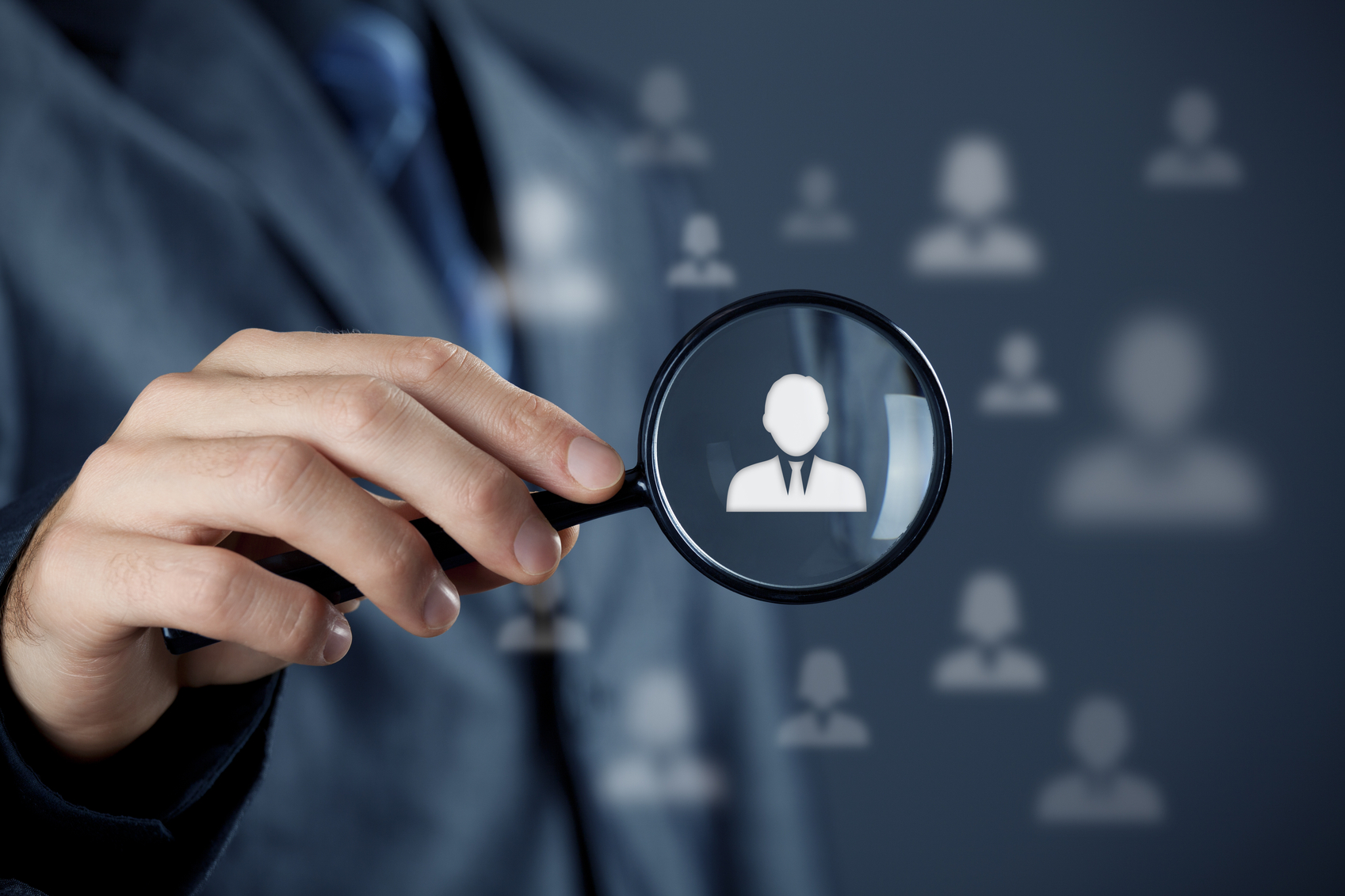 Individual customer service care, personalization, marketing segmentation and targeting, customer relationship management (CRM) and headhunter human resources concepts. Businessman with magnifying glass focused on one person.