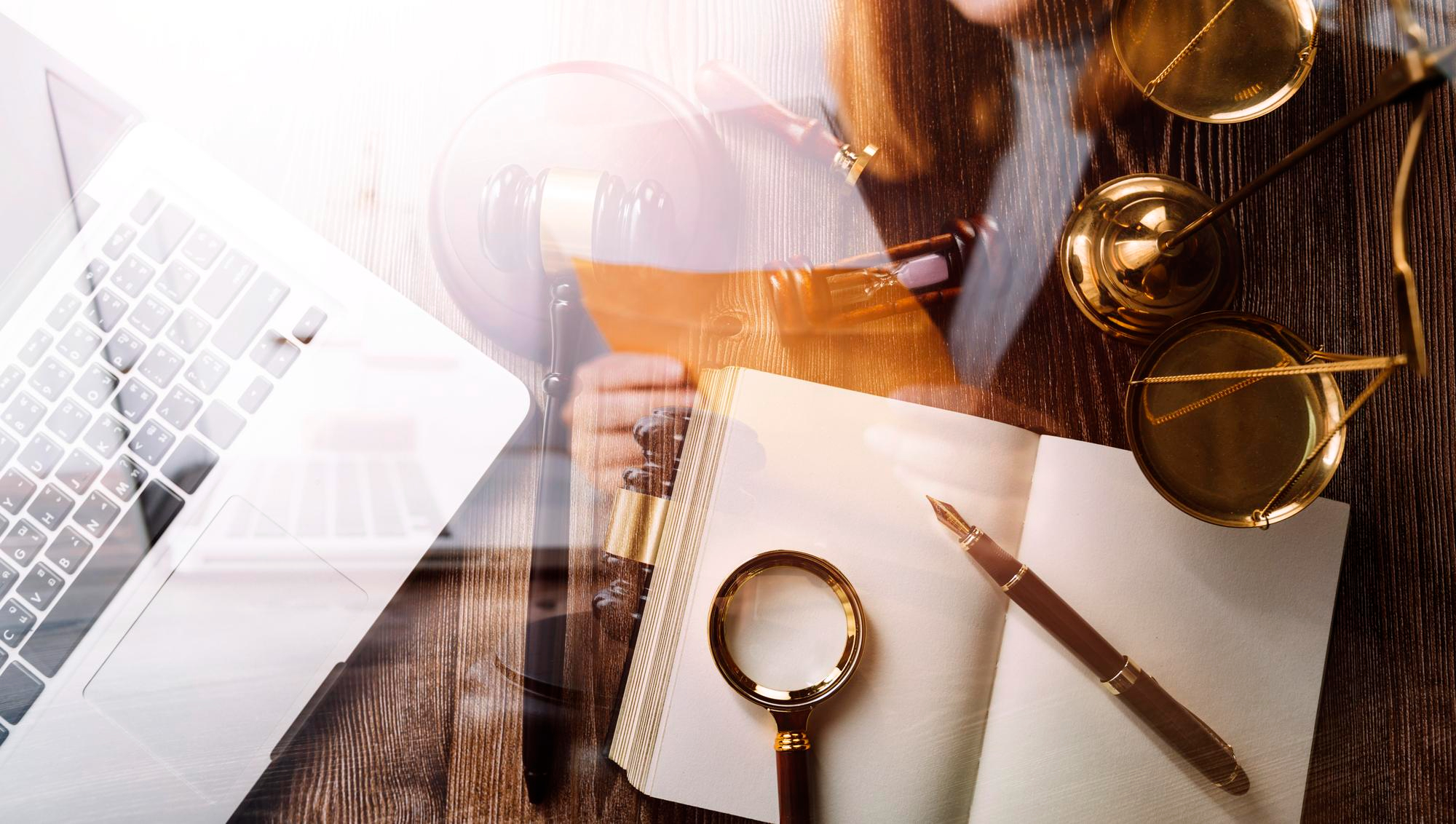 business-lawyers-discussing-contract-papers-with-brass-scale-desk-office-law-legal-services-advice-justice-law-concept-picture-with-film-grain-effect