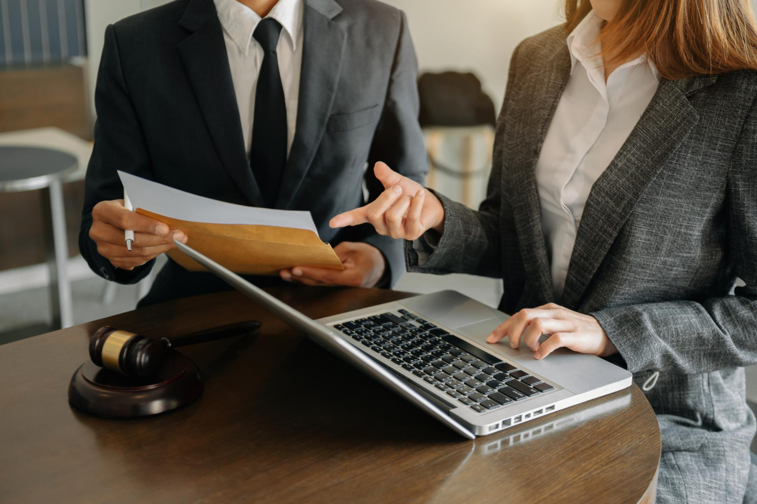 business-people-lawyers-discussing-contract-papers-sitting-table-concepts-law-advice-legal-services-morning-lightxa